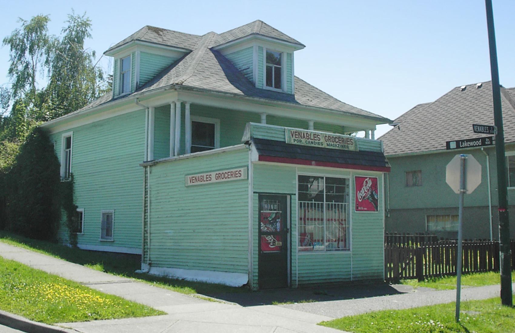 A small corner store that was built on an empty urban space